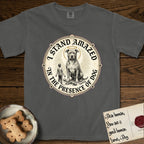 I Stand Amazed in the Presence Pitbull T-Shirt flat lay in Pepper, featuring a vintage engraving medallion of a haloed Pitbull with a small devoted human gazing up from below.
