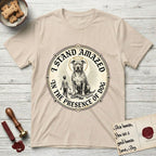 I Stand Amazed in the Presence Pitbull T-Shirt flat lay in Sand, featuring a vintage engraving medallion of a haloed Pitbull with a small devoted human gazing up from below.