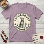 I Stand Amazed in the Presence Rescue Mutt T-Shirt flat lay in Paragon, featuring a vintage engraving medallion of a haloed rescue mutt with a small devoted human gazing up from below.