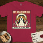 Let Go and Let Dog Beagle T-Shirt flat lay in Chili, featuring a vintage seed packet label with a haloed tricolor Beagle, paws raised, flanked by simple flower sprigs.