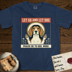 Let Go and Let Dog Beagle T-Shirt flat lay in True Navy, featuring a vintage seed packet label with a haloed tricolor Beagle, paws raised, flanked by simple flower sprigs.
