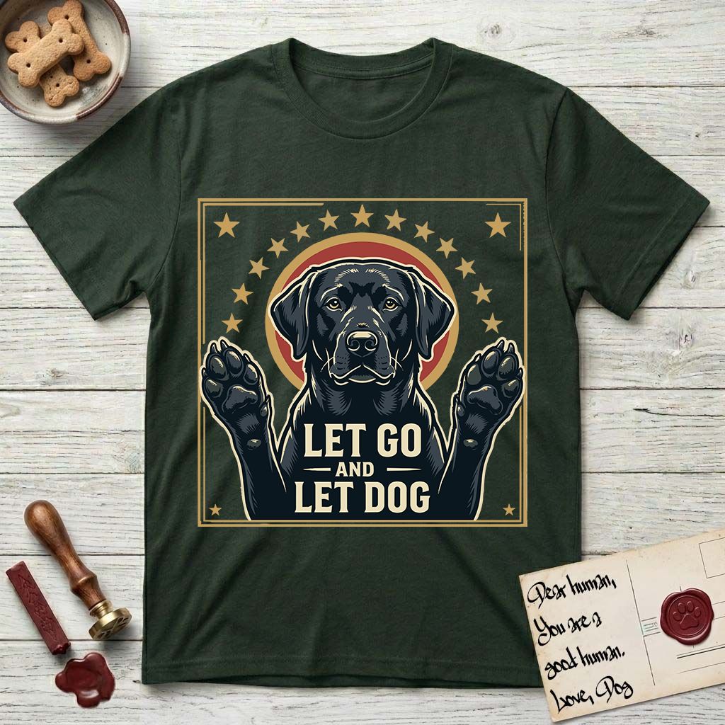 Let Go and Let Dog Black Lab T-Shirt flat lay in Forest Green, featuring a bold Americana star-badge of a haloed Black Lab with both front paws raised.