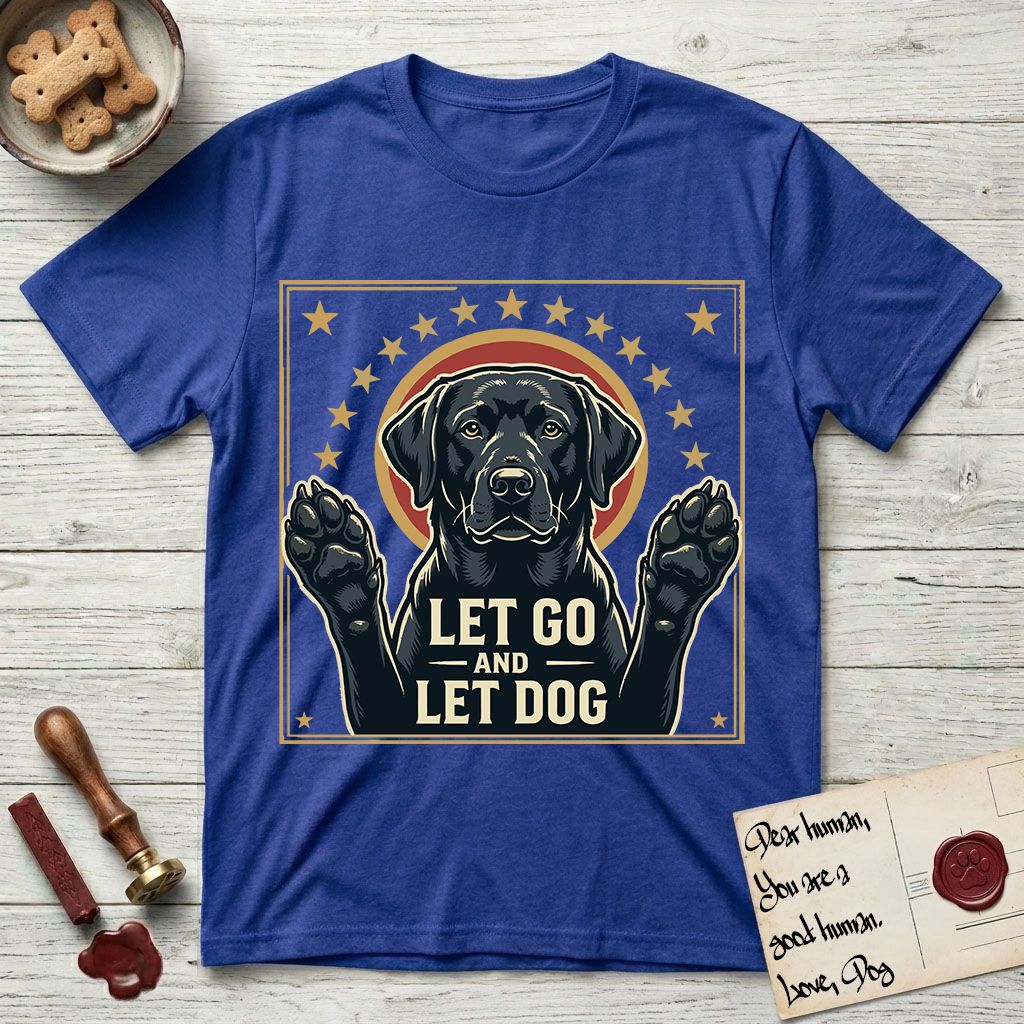 Let Go and Let Dog Black Lab T-Shirt flat lay in Heather Royal, featuring a bold Americana star-badge of a haloed Black Lab with both front paws raised.