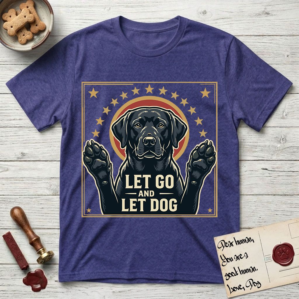 Let Go and Let Dog Black Lab T-Shirt flat lay in Metro Blue, featuring a bold Americana star-badge of a haloed Black Lab with both front paws raised.