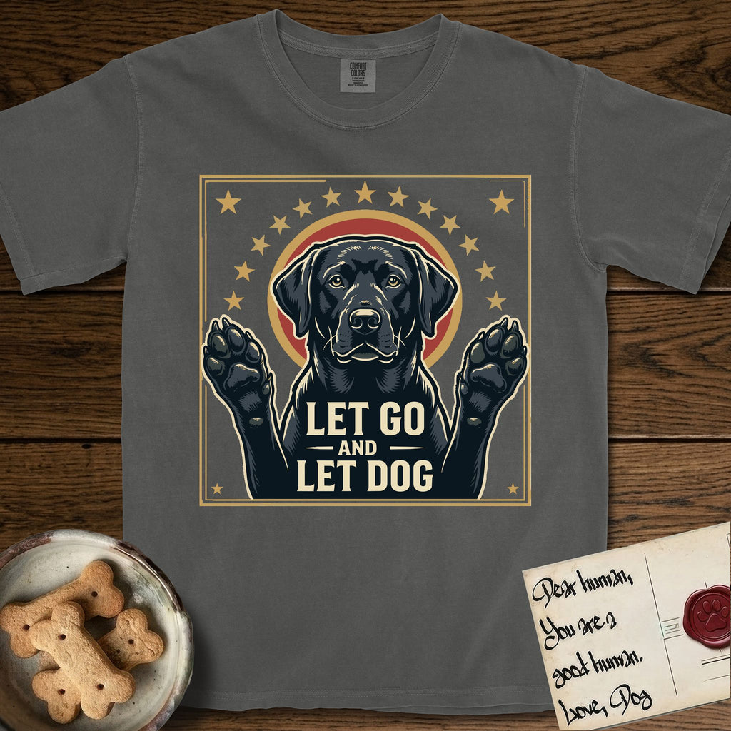 Let Go and Let Dog Black Lab T-Shirt flat lay in Pepper, featuring a bold Americana star-badge of a haloed Black Lab with both front paws raised.