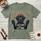 Let Go and Let Dog Black Lab T-Shirt flat lay in Sage, featuring a bold Americana star-badge of a haloed Black Lab with both front paws raised.