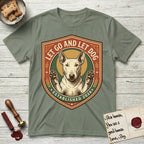 Let Go and Let Dog Bull Terrier T-Shirt flat lay in Sage, featuring a vintage badge of a haloed Bull Terrier with paws raised in blessing.