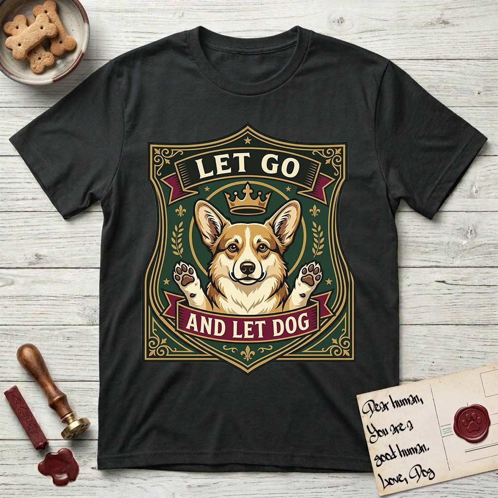 Let Go and Let Dog Corgi T-Shirt flat lay in Black, featuring a royal heraldic shield badge of a crowned, haloed Corgi with paws raised.