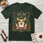 Let Go and Let Dog Corgi T-Shirt flat lay in Forest Green, featuring a royal heraldic shield badge of a crowned, haloed Corgi with paws raised.