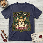 Let Go and Let Dog Corgi T-Shirt flat lay in Navy, featuring a royal heraldic shield badge of a crowned, haloed Corgi with paws raised.