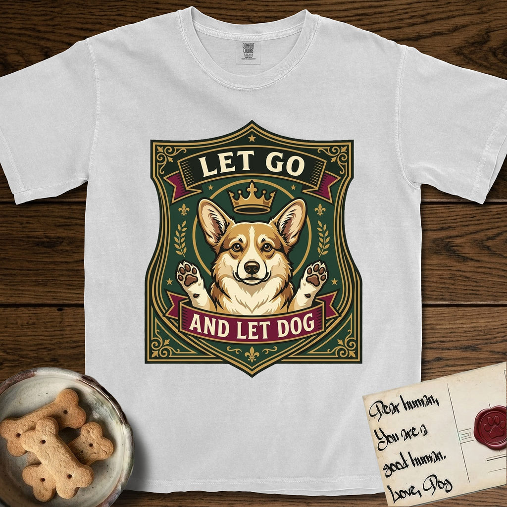 Let Go and Let Dog Corgi T-Shirt flat lay in White, featuring a royal heraldic shield badge of a crowned, haloed Corgi with paws raised.