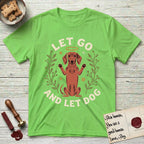Let Go and Let Dog Dachshund T-Shirt flat lay in Lime, featuring a folk-art botanical illustration of a haloed Dachshund sitting up with front paws raised.