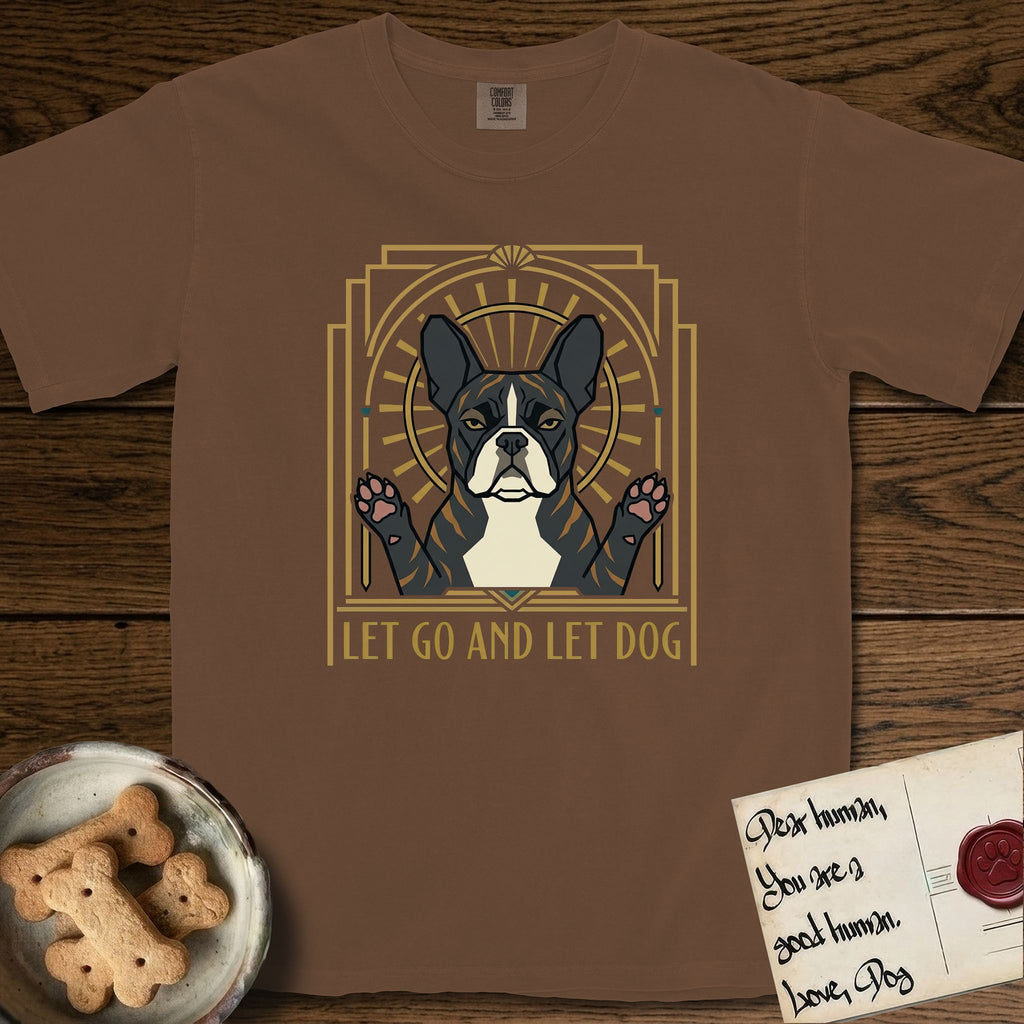Let Go and Let Dog French Bulldog T-Shirt flat lay in Espresso, featuring an Art Deco arch with a haloed brindle French Bulldog, bat ears erect and paws raised, gold sunburst rays behind him.