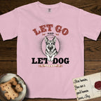 Let Go and Let Dog German Shepherd T-Shirt flat lay in Blossom, featuring a vintage letterpress engraving of a haloed German Shepherd framed by a sunburst oval.