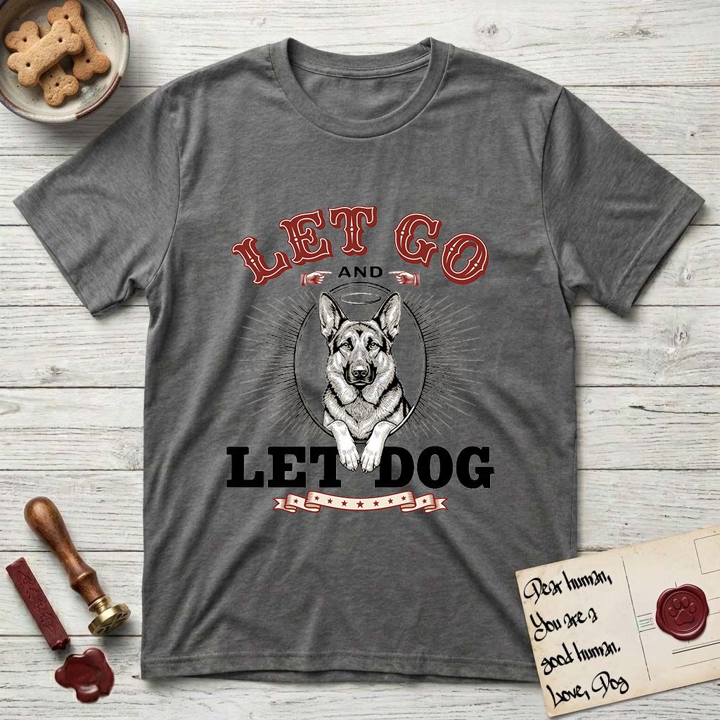 Let Go and Let Dog German Shepherd T-Shirt flat lay in Dark Heather, featuring a vintage letterpress engraving of a haloed German Shepherd framed by a sunburst oval.