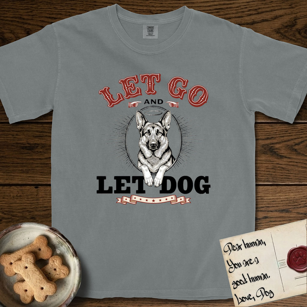 Let Go and Let Dog German Shepherd T-Shirt flat lay in Granite, featuring a vintage letterpress engraving of a haloed German Shepherd framed by a sunburst oval.