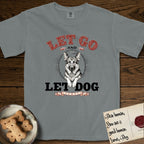 Let Go and Let Dog German Shepherd T-Shirt flat lay in Granite, featuring a vintage letterpress engraving of a haloed German Shepherd framed by a sunburst oval.