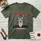 Let Go and Let Dog German Shepherd T-Shirt flat lay in Heather Military Green, featuring a vintage letterpress engraving of a haloed German Shepherd framed by a sunburst oval.