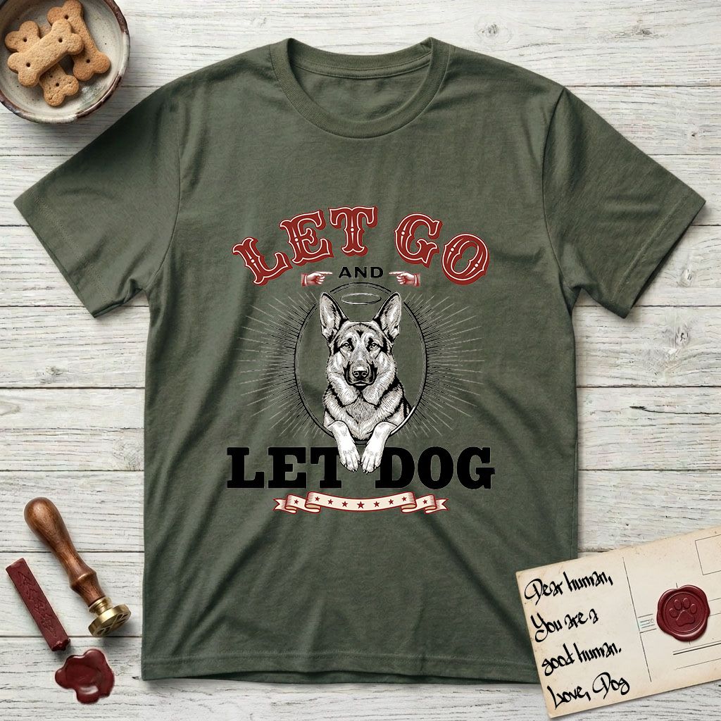 Let Go and Let Dog German Shepherd T-Shirt flat lay in Heather Military Green, featuring a vintage letterpress engraving of a haloed German Shepherd framed by a sunburst oval.