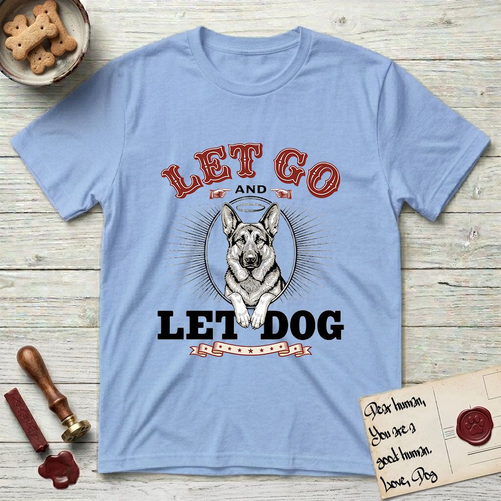 Let Go and Let Dog German Shepherd T-Shirt flat lay in Light Blue, featuring a vintage letterpress engraving of a haloed German Shepherd framed by a sunburst oval.