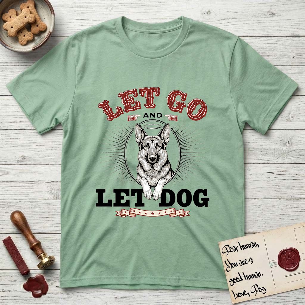 Let Go and Let Dog German Shepherd T-Shirt flat lay in Mint Green, featuring a vintage letterpress engraving of a haloed German Shepherd framed by a sunburst oval.