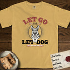Let Go and Let Dog German Shepherd T-Shirt flat lay in Mustard, featuring a vintage letterpress engraving of a haloed German Shepherd framed by a sunburst oval.