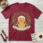 Let Go and Let Dog Golden Retriever T-Shirt flat lay in Cardinal Red, featuring an Art Nouveau wildflower wreath around a haloed Golden Retriever with front paws raised.