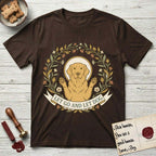 Let Go and Let Dog Golden Retriever T-Shirt flat lay in Dark Chocolate, featuring an Art Nouveau wildflower wreath around a haloed Golden Retriever with front paws raised.