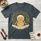 Let Go and Let Dog Golden Retriever T-Shirt flat lay in Dark Heather Grey, featuring an Art Nouveau wildflower wreath around a haloed Golden Retriever with front paws raised.