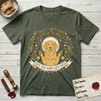 Let Go and Let Dog Golden Retriever T-Shirt flat lay in Heather Military Green, featuring an Art Nouveau wildflower wreath around a haloed Golden Retriever with front paws raised.