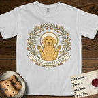 Let Go and Let Dog Golden Retriever T-Shirt flat lay in White, featuring an Art Nouveau wildflower wreath around a haloed Golden Retriever with front paws raised.