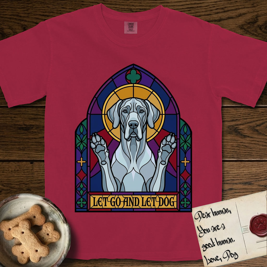 Let Go and Let Dog Great Dane T-Shirt flat lay in Chili, featuring a stained-glass cathedral window of a haloed Great Dane with paws raised.
