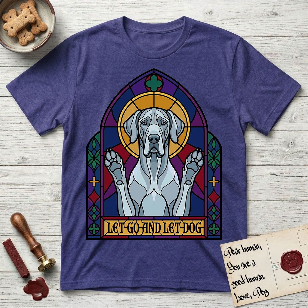 Let Go and Let Dog Great Dane T-Shirt flat lay in Metro Blue, featuring a stained-glass cathedral window of a haloed Great Dane with paws raised.