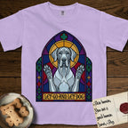 Let Go and Let Dog Great Dane T-Shirt flat lay in Orchid, featuring a stained-glass cathedral window of a haloed Great Dane with paws raised.