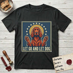 Let Go and Let Dog Irish Setter T-Shirt flat lay in Black, featuring a vintage devotional poster of a haloed Irish Setter with paws raised and a ring of stars.