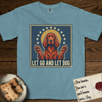 Let Go and Let Dog Irish Setter T-Shirt flat lay in Ice Blue, featuring a vintage devotional poster of a haloed Irish Setter with paws raised and a ring of stars.