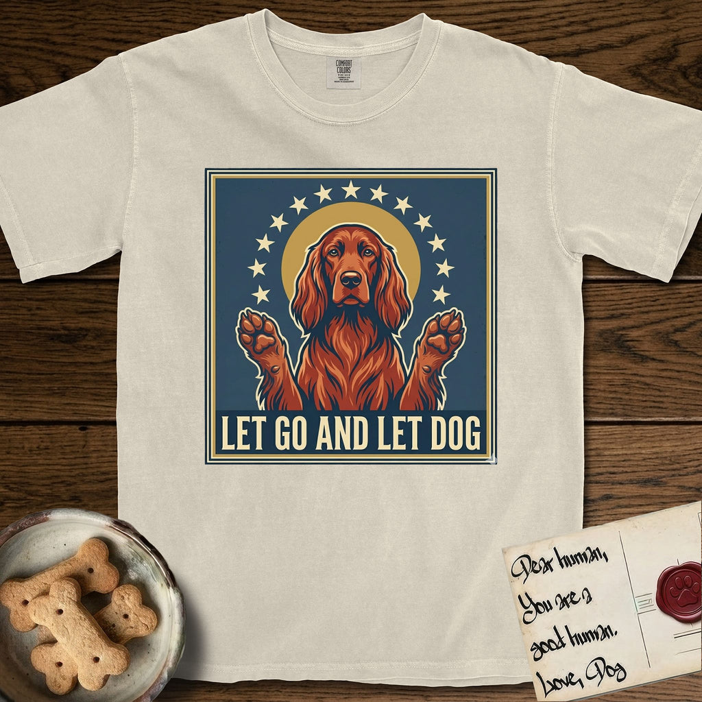 Let Go and Let Dog Irish Setter T-Shirt flat lay in Ivory, featuring a vintage devotional poster of a haloed Irish Setter with paws raised and a ring of stars.
