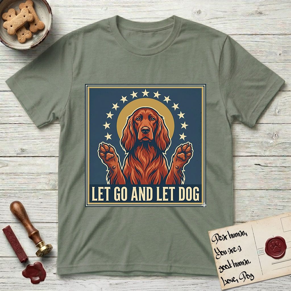 Let Go and Let Dog Irish Setter T-Shirt flat lay in Sage, featuring a vintage devotional poster of a haloed Irish Setter with paws raised and a ring of stars.