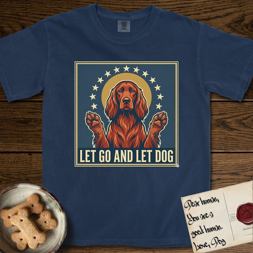 Let Go and Let Dog Irish Setter T-Shirt flat lay in True Navy, featuring a vintage devotional poster of a haloed Irish Setter with paws raised and a ring of stars.