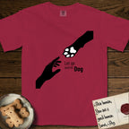Let Go and Let Dog Paw T-Shirt flat lay in Chili, featuring a minimalist silhouette of a human hand and a Dog paw reaching toward each other, almost touching.