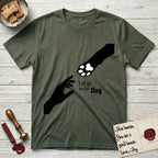 Let Go and Let Dog Paw T-Shirt flat lay in Heather Military Green, featuring a minimalist silhouette of a human hand and a Dog paw reaching toward each other, almost touching.
