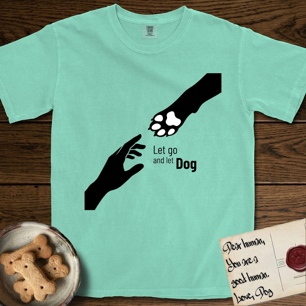 Let Go and Let Dog Paw T-Shirt flat lay in Island Reef, featuring a minimalist silhouette of a human hand and a Dog paw reaching toward each other, almost touching.