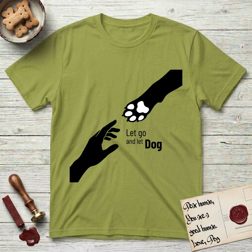 Let Go and Let Dog Paw T-Shirt flat lay in Kiwi, featuring a minimalist silhouette of a human hand and a Dog paw reaching toward each other, almost touching.