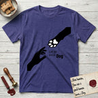 Let Go and Let Dog Paw T-Shirt flat lay in Metro Blue, featuring a minimalist silhouette of a human hand and a Dog paw reaching toward each other, almost touching.