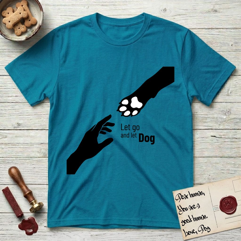Let Go and Let Dog Paw T-Shirt flat lay in Tropical Blue, featuring a minimalist silhouette of a human hand and a Dog paw reaching toward each other, almost touching.