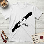 Let Go and Let Dog Paw T-Shirt flat lay in White, featuring a minimalist silhouette of a human hand and a Dog paw reaching toward each other, almost touching.