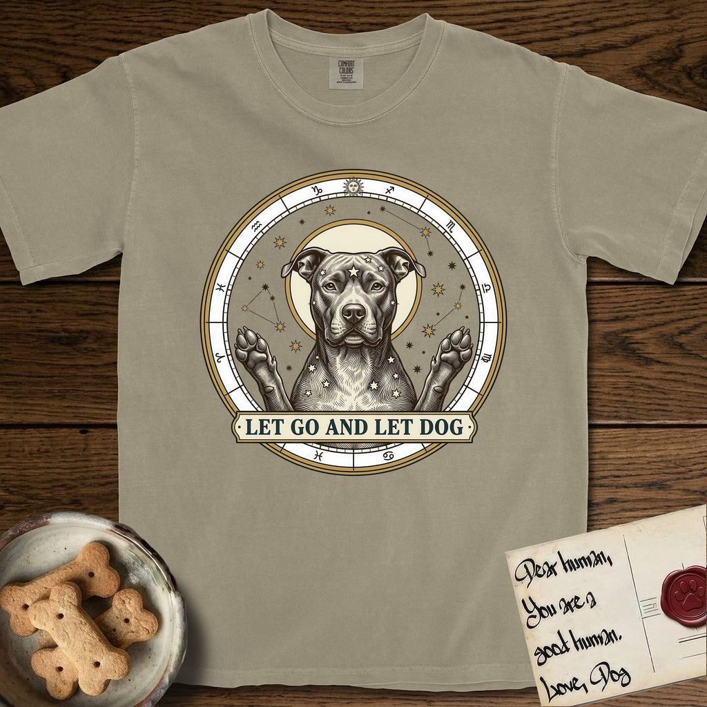 Let Go and Let Dog Pitbull T-Shirt flat lay in Khaki, featuring an antique engraved celestial star chart with a haloed Pitbull at the center, natural folded ears and paws raised, stars carved across his coat.