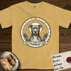 Let Go and Let Dog Pitbull T-Shirt flat lay in Mustard, featuring an antique engraved celestial star chart with a haloed Pitbull at the center, natural folded ears and paws raised, stars carved across his coat.