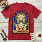 Let Go and Let Dog Poodle T-Shirt flat lay in Cherry Red, featuring a stained-glass illustration of a haloed Poodle with paws raised.