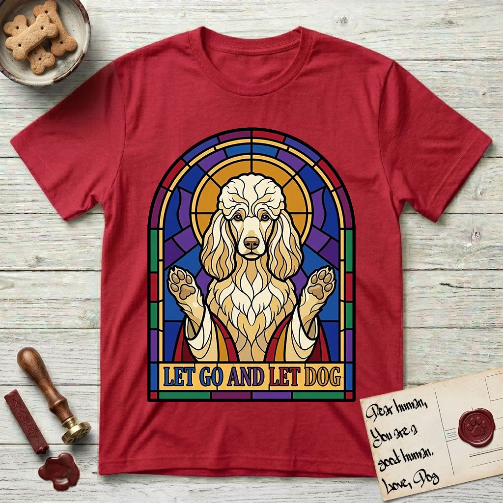 Let Go and Let Dog Poodle T-Shirt flat lay in Cherry Red, featuring a stained-glass illustration of a haloed Poodle with paws raised.